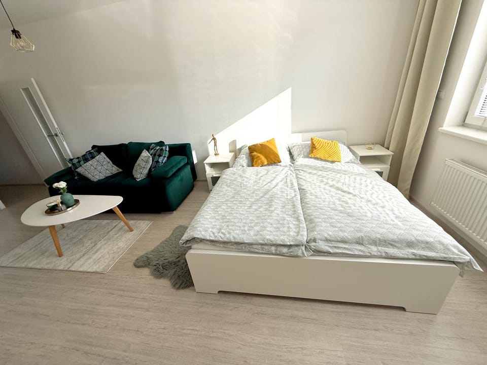 Bed, Living room, Seating area, Bedroom