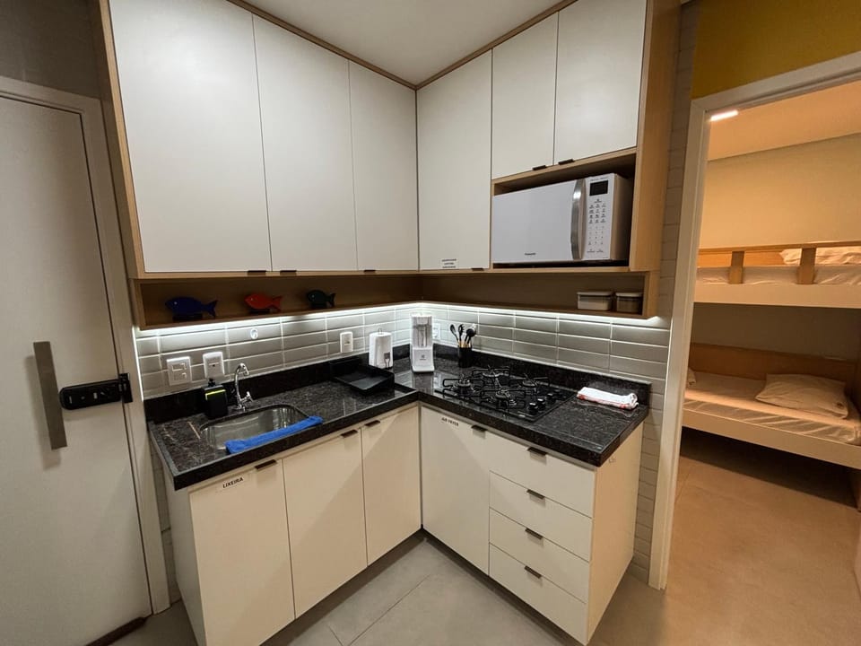 Kitchen or kitchenette, microwave