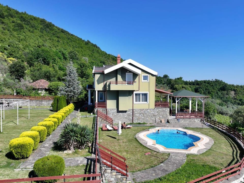 Property building, Natural landscape, Garden, Swimming pool