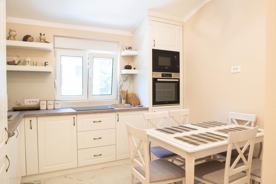 Dining area, dishwasher, oven, stove