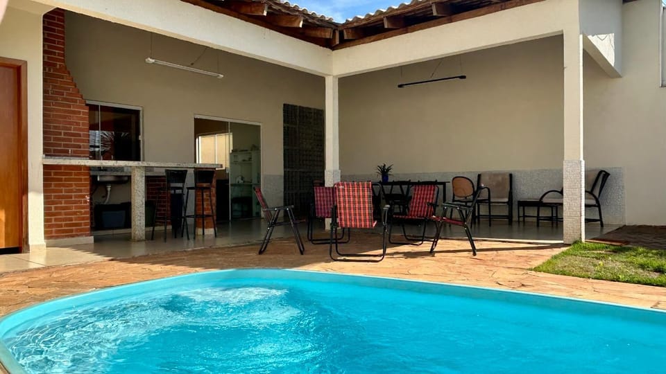 Property building, Patio, BBQ facilities, Dining area, Pool view, Swimming pool