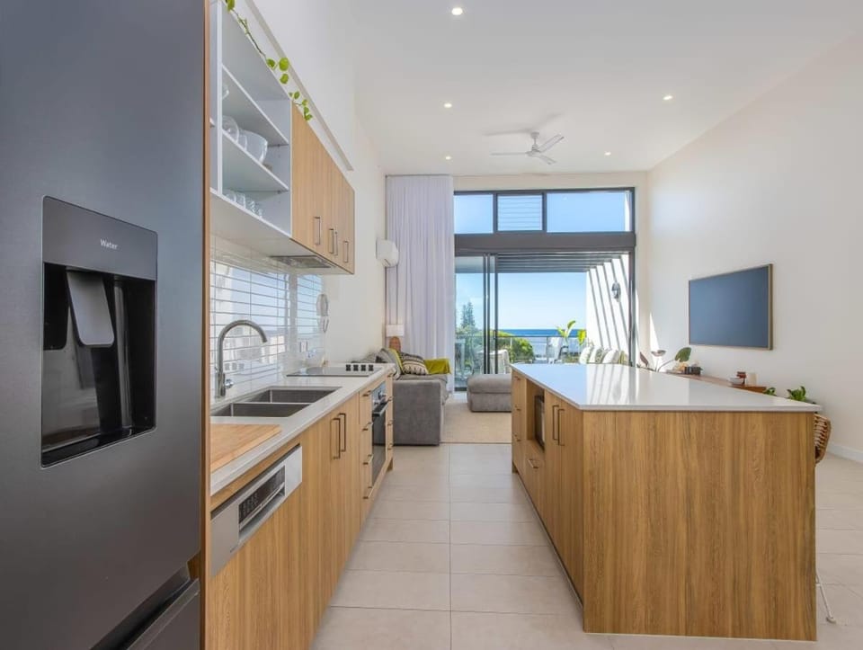 Kitchen or kitchenette, dishwasher, oven, stove