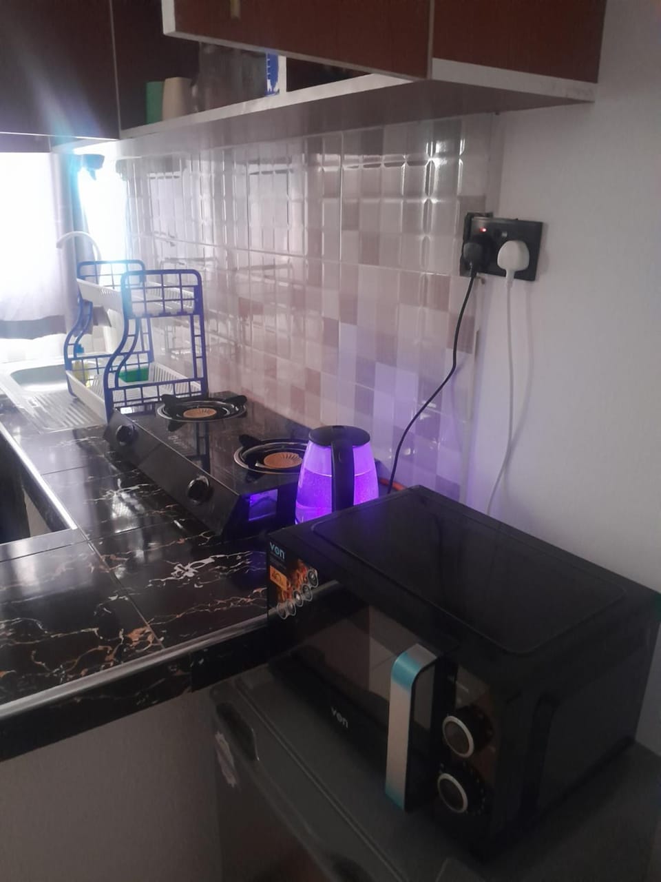 Kitchen or kitchenette, stove