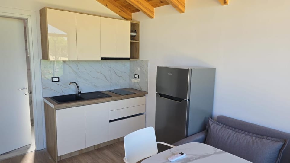 Kitchen or kitchenette, oven, stove