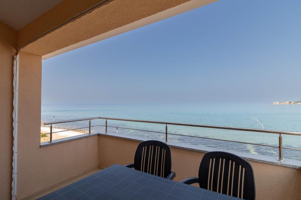 View (from property/room), Balcony/Terrace, Living room, Seating area, Sea view