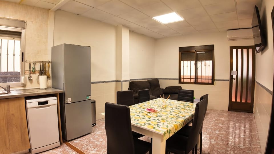 Kitchen or kitchenette, Living room, Seating area, Dining area, air conditioner