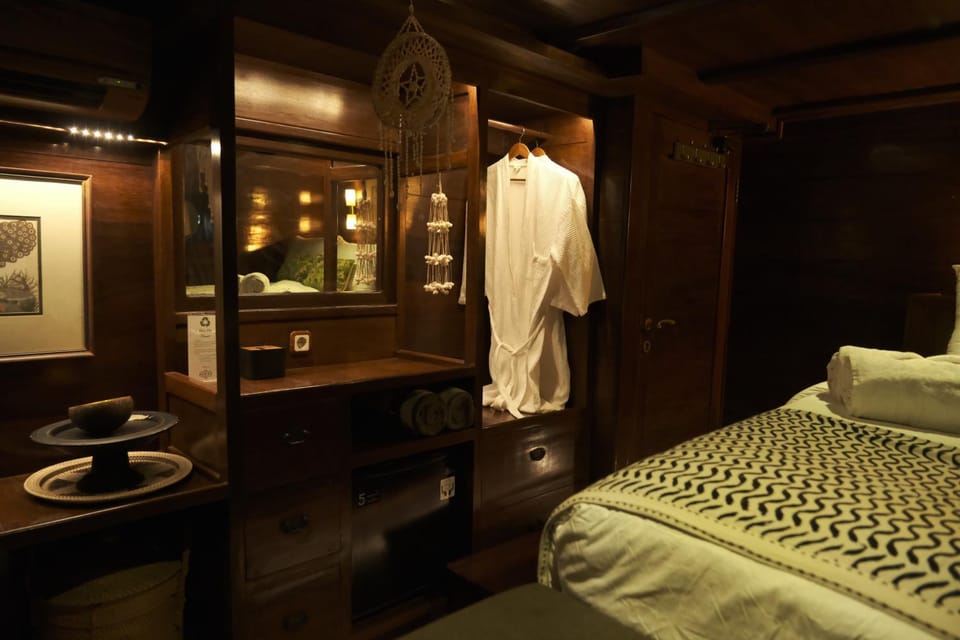 Open Trip Behike Luxury Phinisi - 3D2N Komodo National Park Docked boat in Indonesia