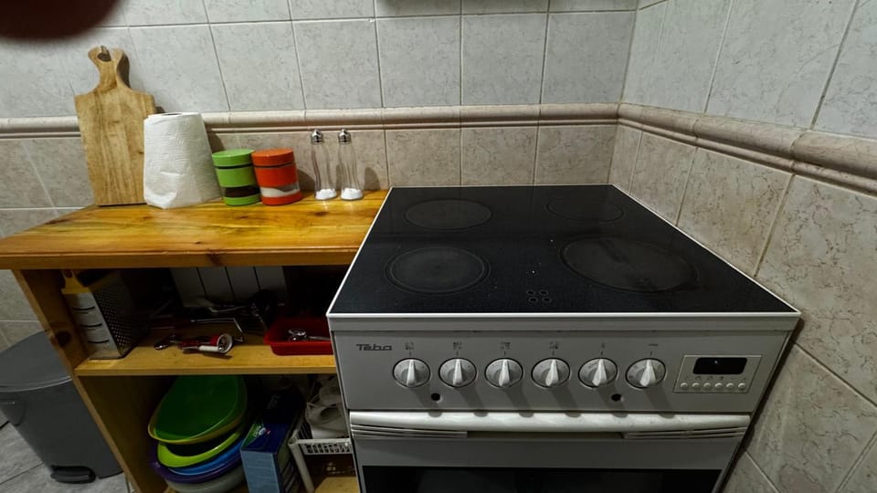 Kitchen or kitchenette, stove