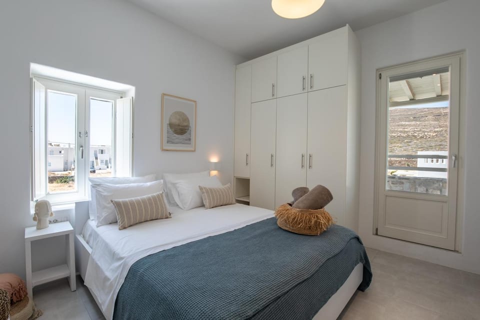 Bed, towels, wardrobe