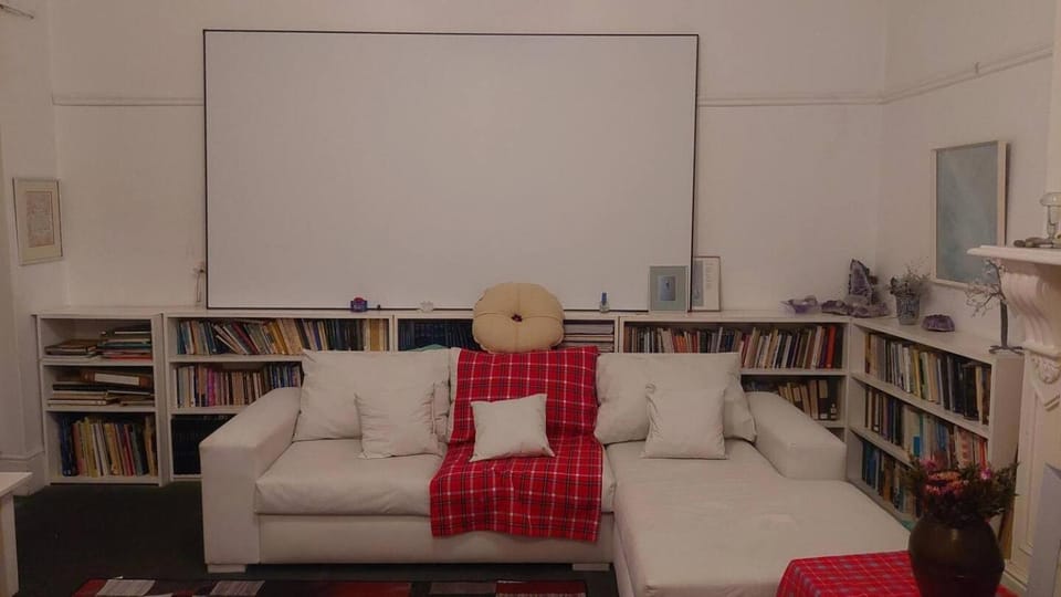 Library, Living room, Seating area, Bedroom