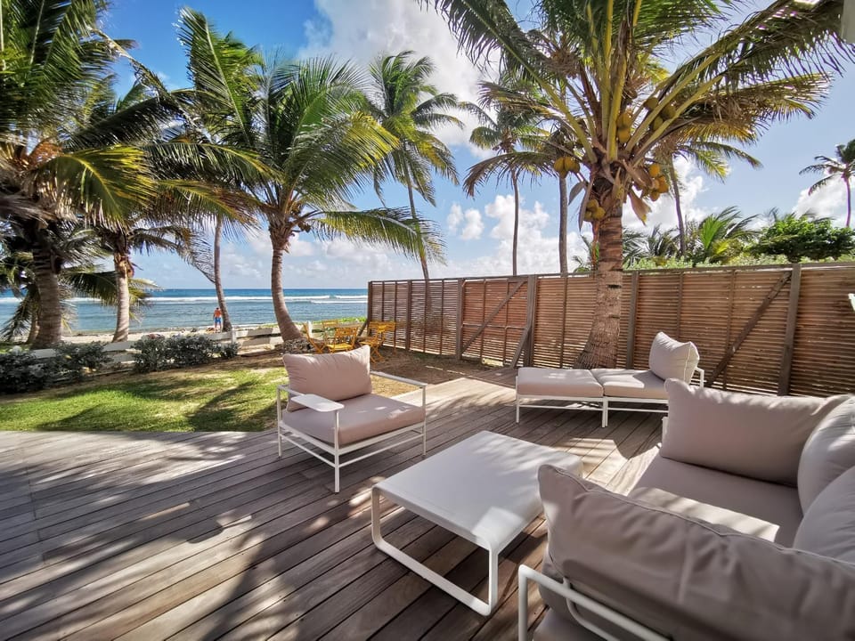 Patio, Spring, Day, Natural landscape, Garden, Garden, View (from property/room), Balcony/Terrace, Living room, Seating area, Beach, Garden view, Sea view, sunbed