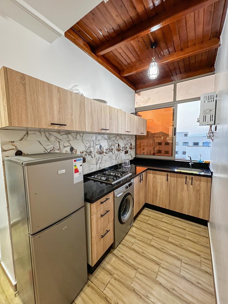 Kitchen or kitchenette, dishwasher, stove