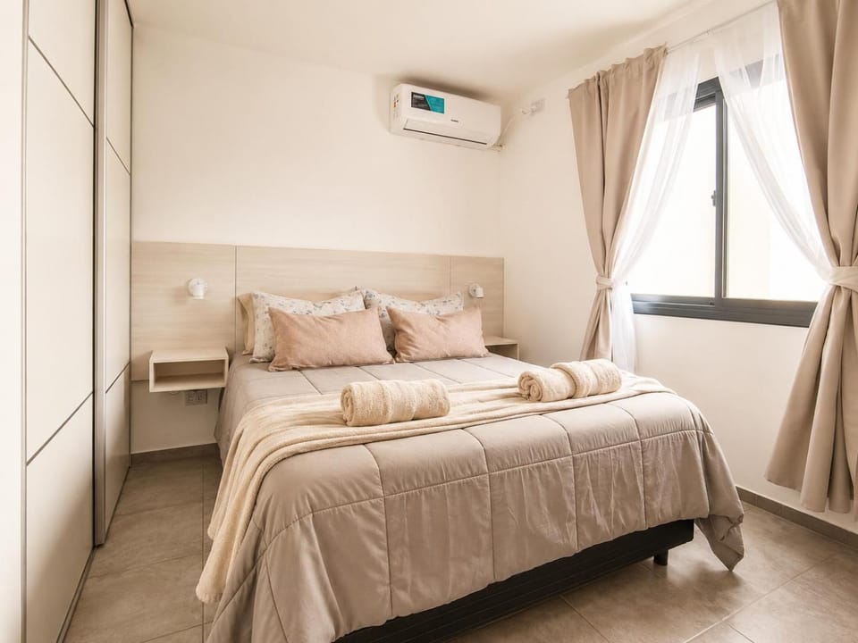 Bed, Bedroom, towels, wardrobe, air conditioner