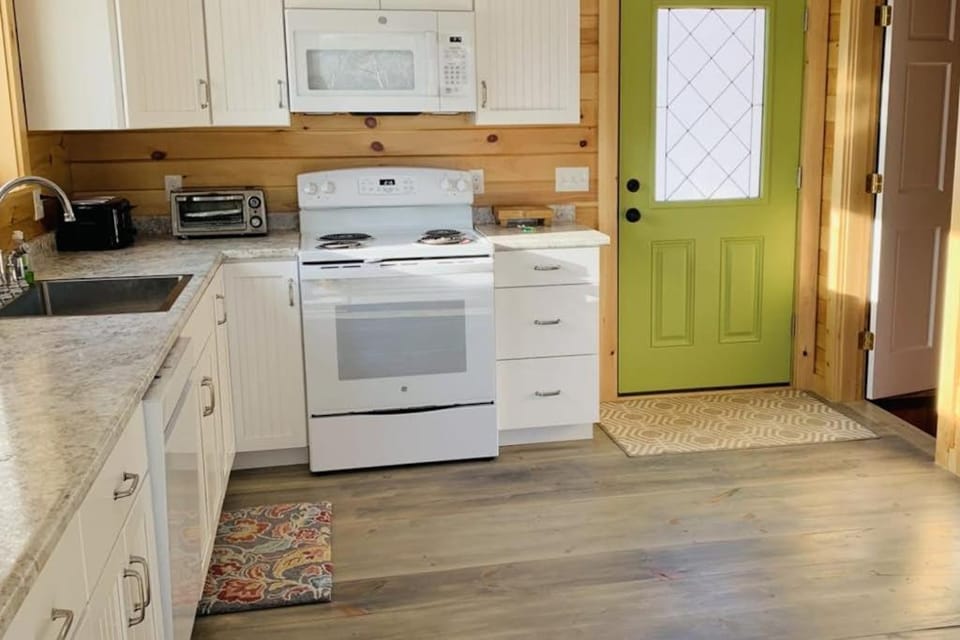 Kitchen or kitchenette, oven, stove, toaster