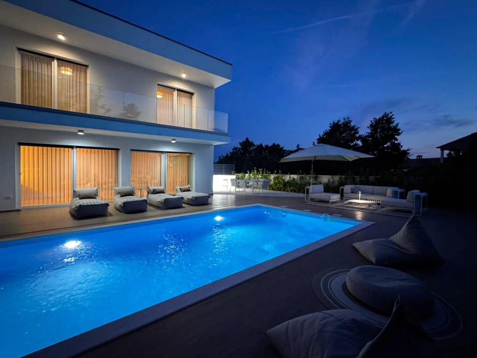 Patio, Night, Balcony/Terrace, Pool view, Swimming pool, sunbed