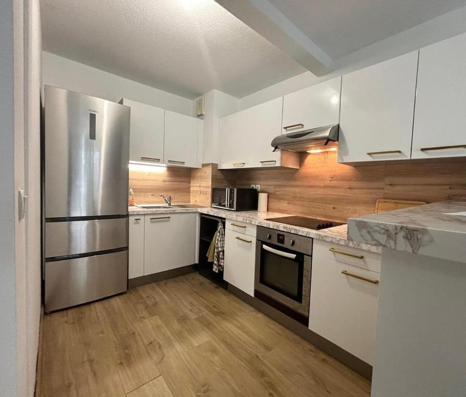 Kitchen or kitchenette, oven, stove, toaster