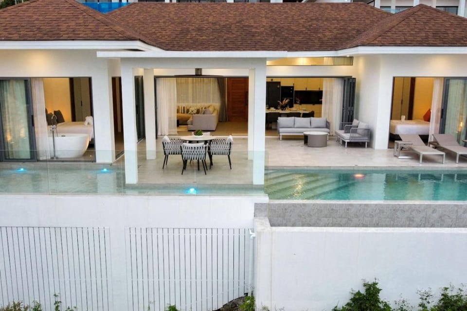 Property building, Patio, Pool view, Swimming pool, sunbed