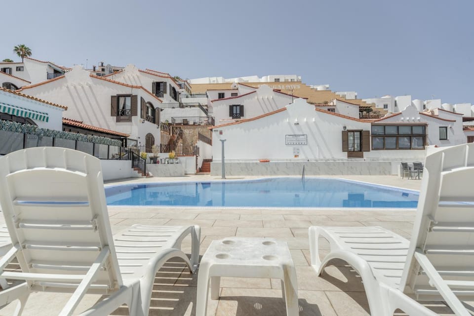 Property building, Living room, Swimming pool