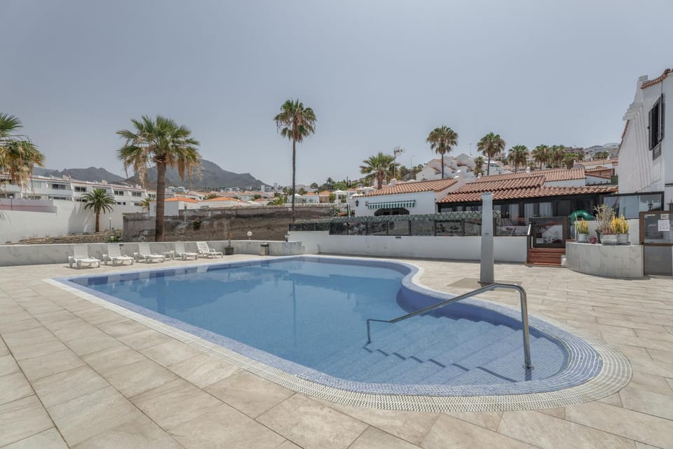Property building, Living room, Swimming pool