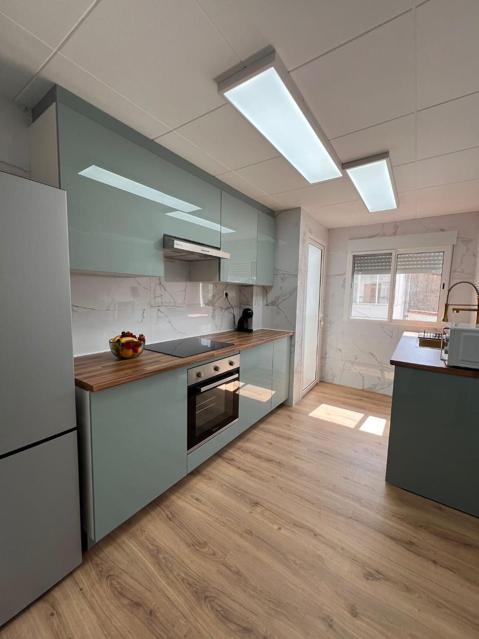 Kitchen or kitchenette, oven, stove