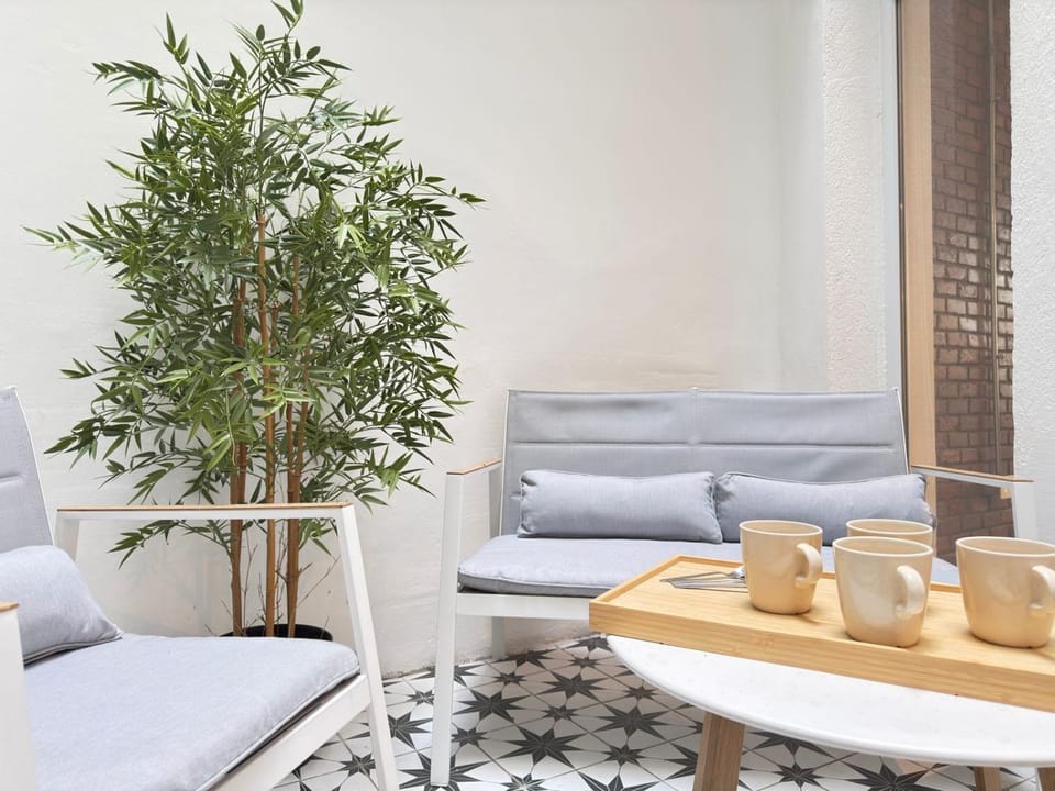 HOM I Estilo Loft Terraza Planta Baja Lastarria Apartment in Santiago