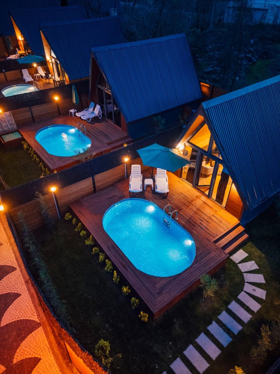 Patio, Night, Pool view, Swimming pool, sunbed, towels