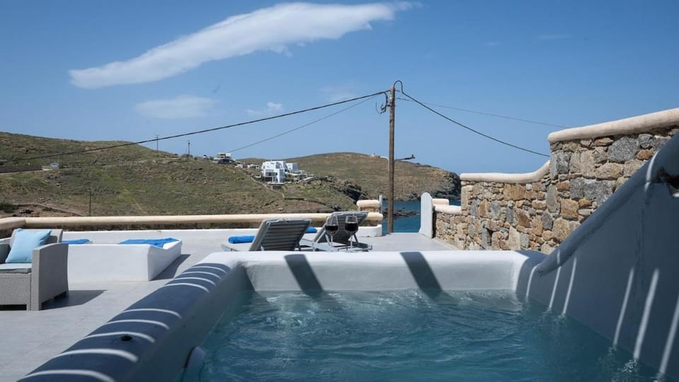 Ultramare Mykonos Beachfront House with 2 Outdoor Tubs House in Mykonos, Mikonos 846 00, Greece