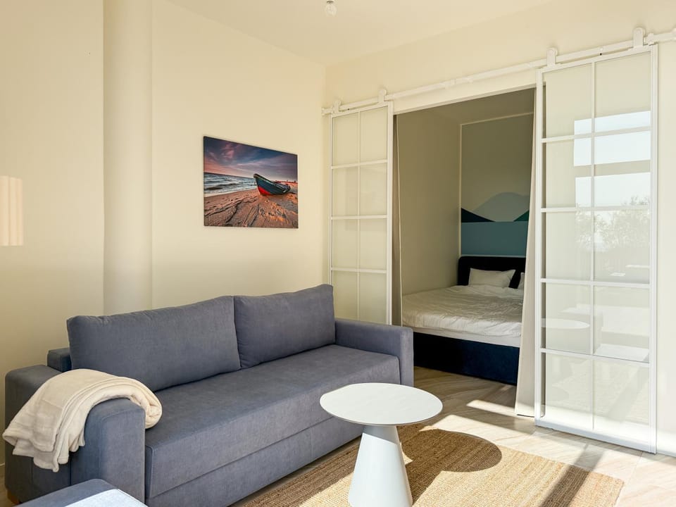 Bed, Living room, Seating area