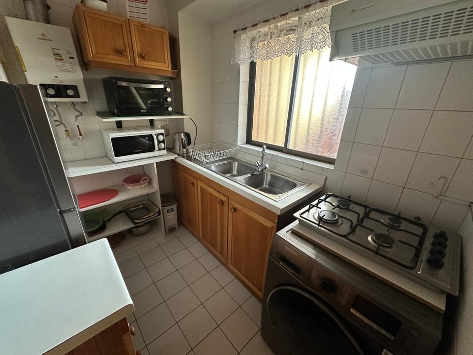 Kitchen or kitchenette, oven