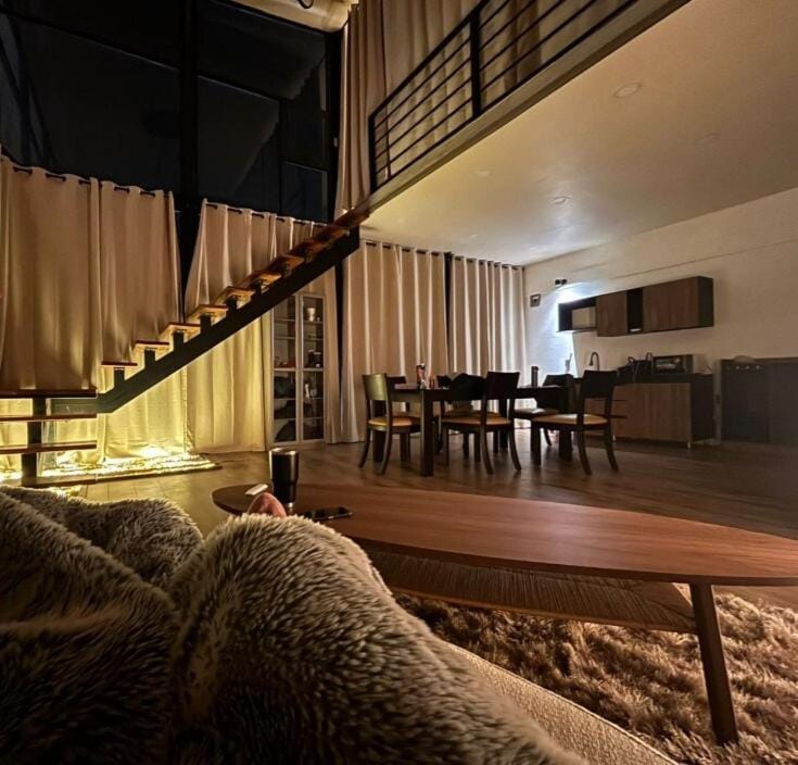 Kitchen or kitchenette, Living room, Seating area, Dining area