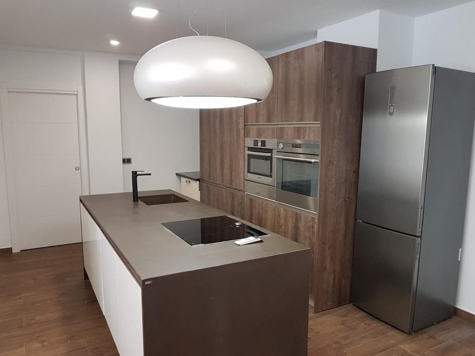 Kitchen or kitchenette, dishwasher, oven, stove
