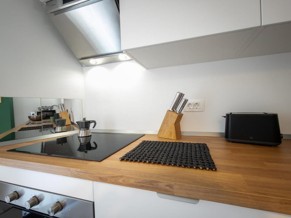 Kitchen or kitchenette, stove, toaster