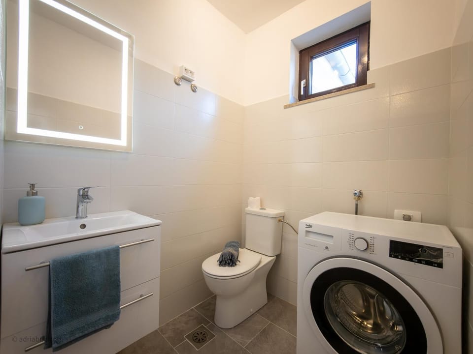 Bathroom, washing machine, dryer