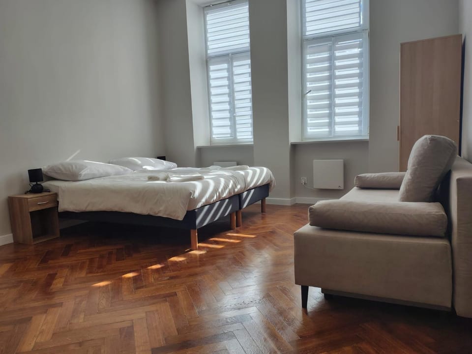 Bed, Living room, Seating area, Bedroom