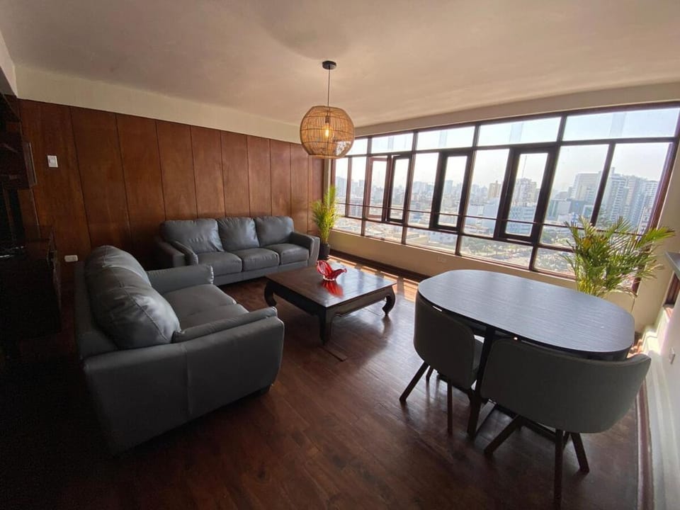 View (from property/room), Living room, Seating area, City view