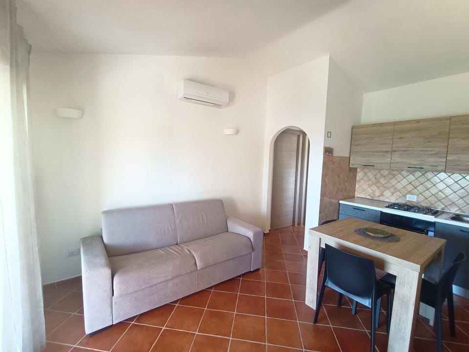 Kitchen or kitchenette, Living room, Seating area, Dining area, air conditioner
