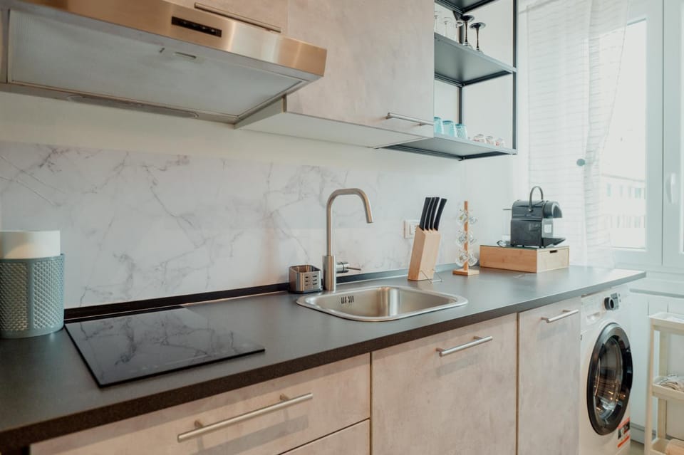 Kitchen or kitchenette, dishwasher, stove, washing machine