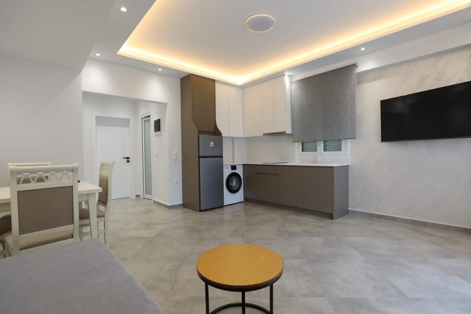 TV and multimedia, Kitchen or kitchenette, Living room, Seating area, Dining area, oven, air conditioner
