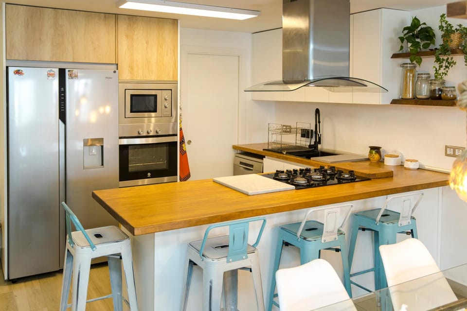 Kitchen or kitchenette, oven, stove, toaster