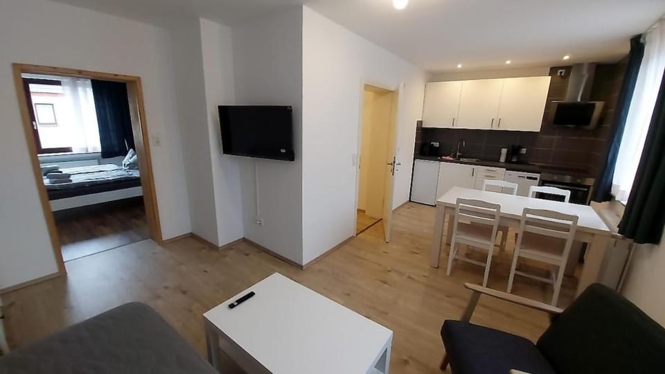 Communal lounge/ TV room, Bed, Kitchen or kitchenette, Living room, Photo of the whole room, Seating area, Dining area, stove