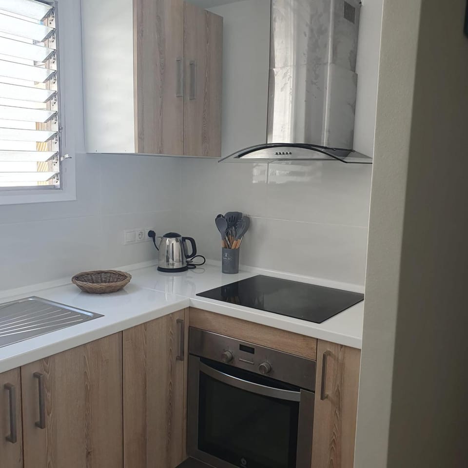 Kitchen or kitchenette, stove