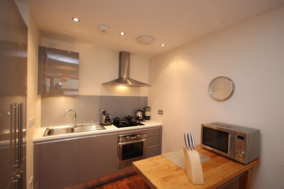 Kitchen or kitchenette, oven, stove, toaster