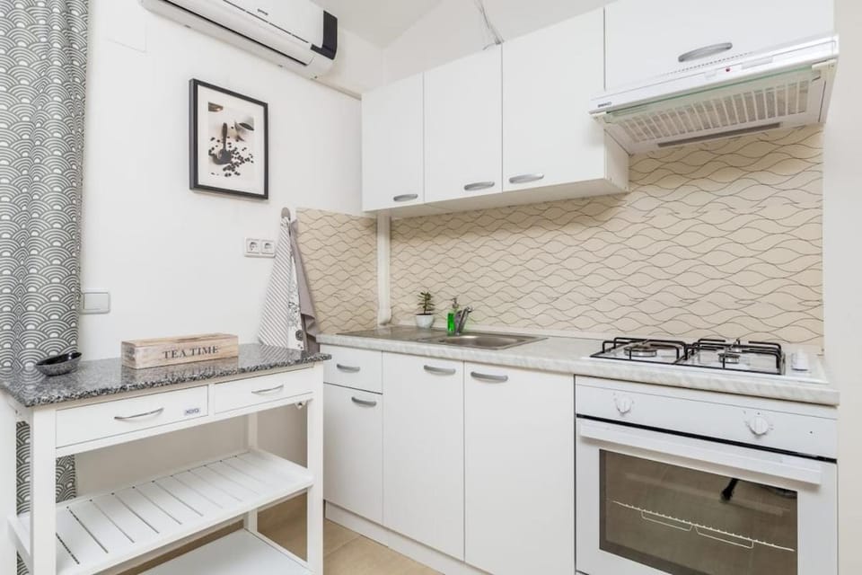 Kitchen or kitchenette, stove