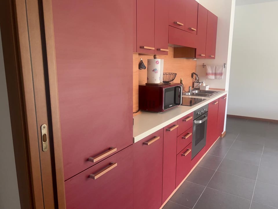 Kitchen or kitchenette, oven, stove, toaster, kitchen