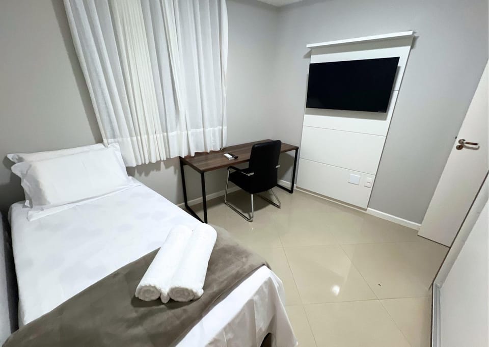 RefugioBacutia- Prédio FRENTE MAR Bacutia- 6 pessoas- 3 Quartos com AR sendo 1 suite - varanda- sala de estar e jantar Ampla -Piscina e Sauna no Prédio Apartment in Guarapari