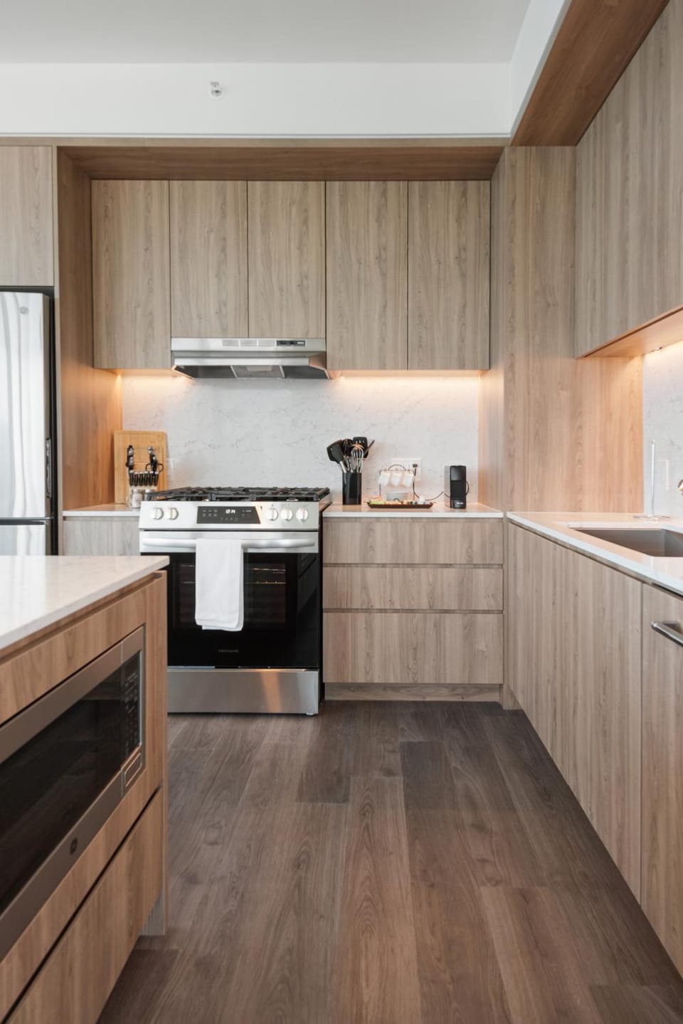 Kitchen or kitchenette, dishwasher, oven, stove, toaster