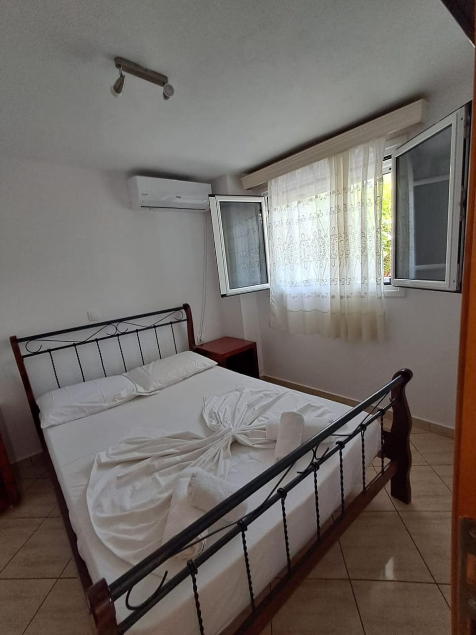 Bed, Photo of the whole room, Bedroom, towels, air conditioner