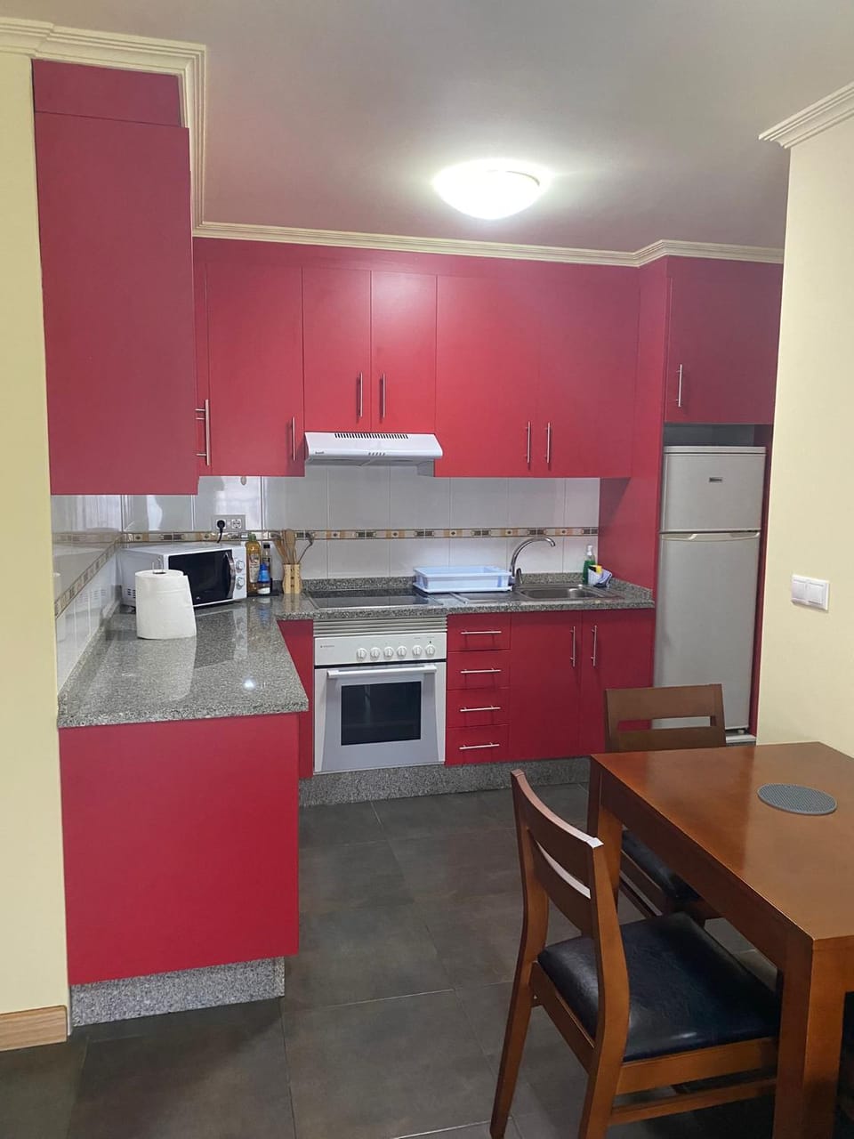 Kitchen or kitchenette, oven, stove