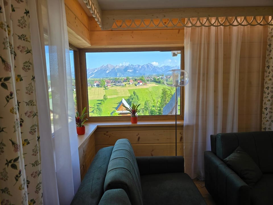 Natural landscape, Living room, Seating area, Mountain view