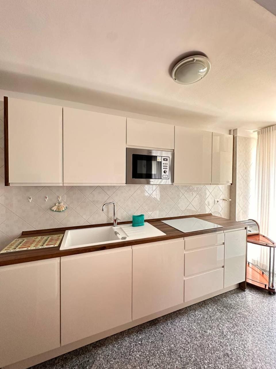 Kitchen or kitchenette, microwave, stove, kitchen